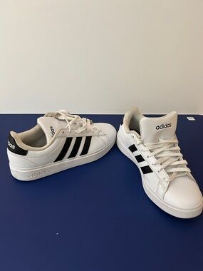 Women’s adidas White Sneakers with Black Three-Stripes